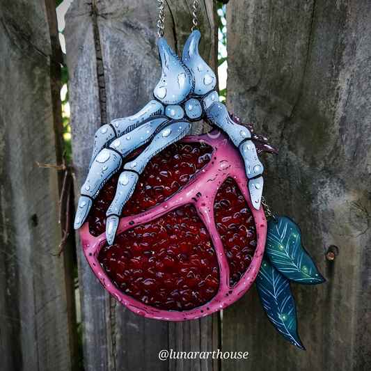 Pomegranate Skelly Hand secret compartment